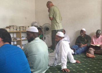 Brothers waiting for Jummah Khutbah