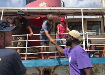 Br. Billal shaking hands with Captain from Greneda